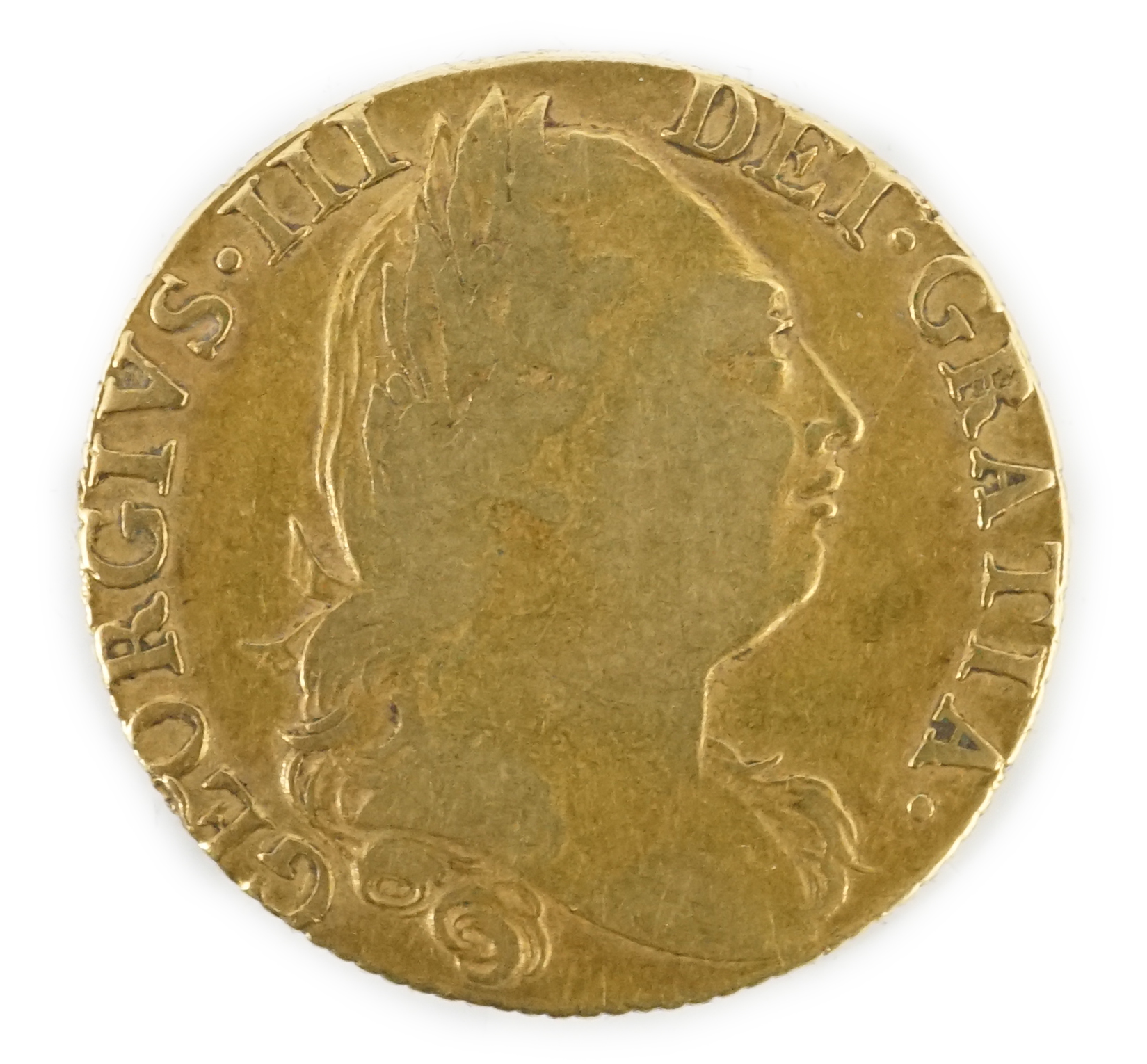 A George III gold guinea 1777, F